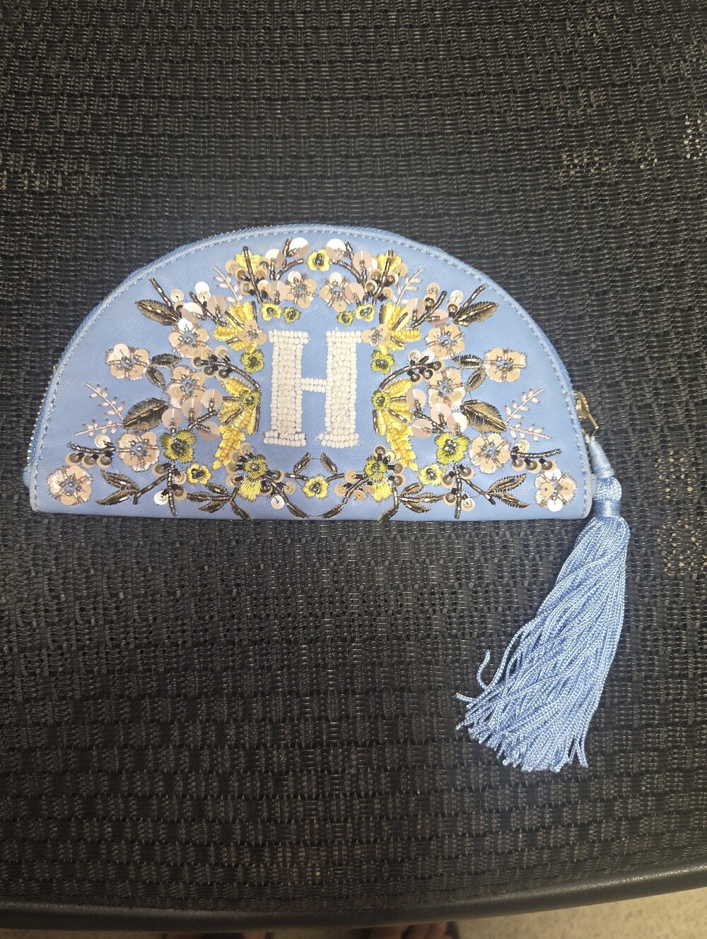 Anthropologie Light Blue Embroidered Floral Tassel Pouch with 'H' Monogram
